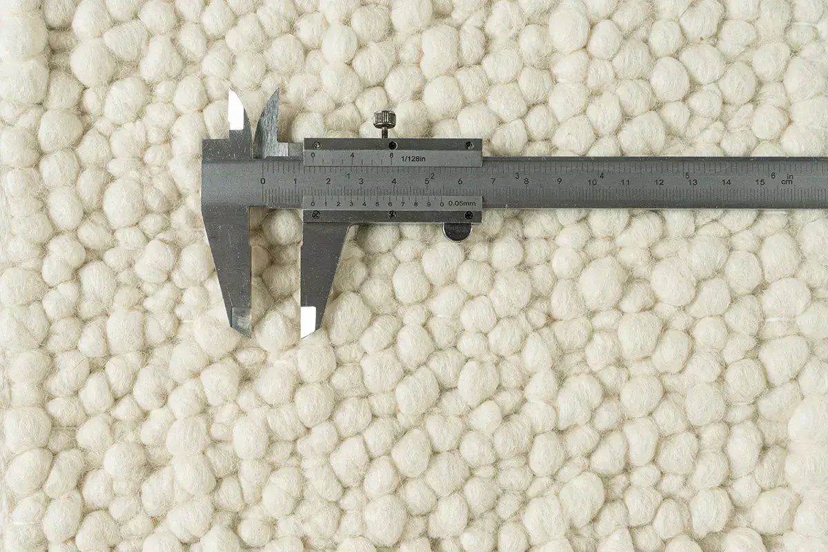 Seeing the texture: Understanding the design language of carpets from their texture